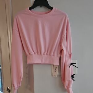 Light Pink Cropped Crew Neck shirt Black Ribbon Detail Long Sleeves NWT Small